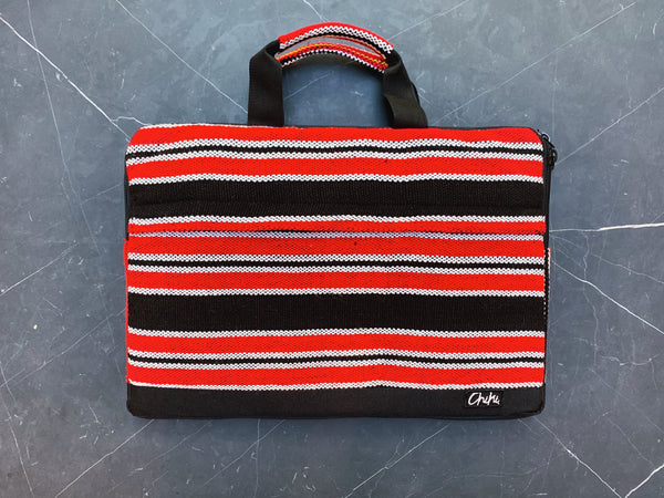 A laptop bag with red, black and white stripes and has handles. The name of the laptop bag is Davao.
