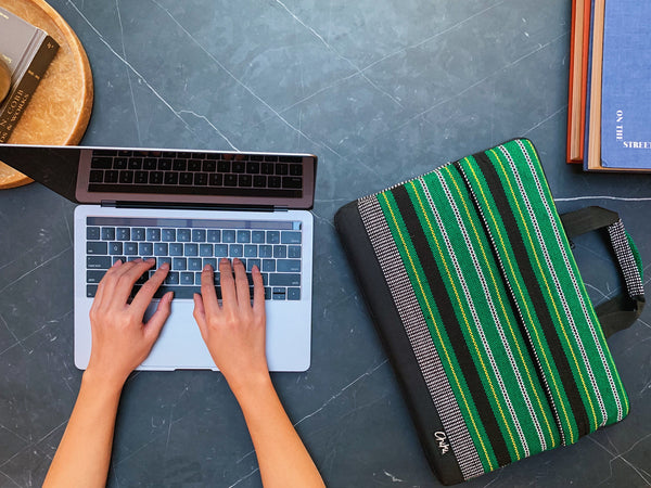 A green and black striped laptop bag. The name of the laptop bag is Cebu.